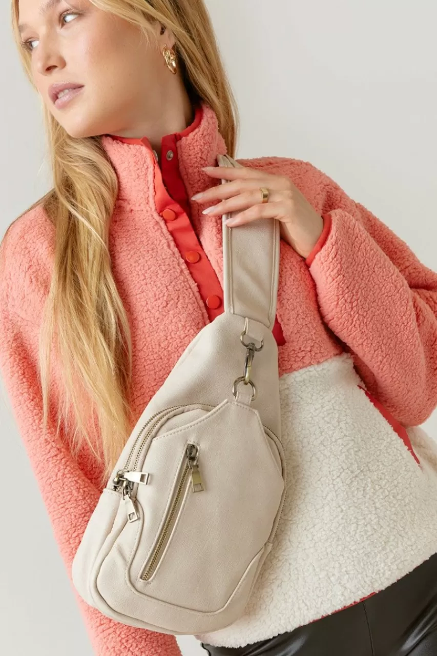 Francesca's Brie Front Zipper Sling Backpack