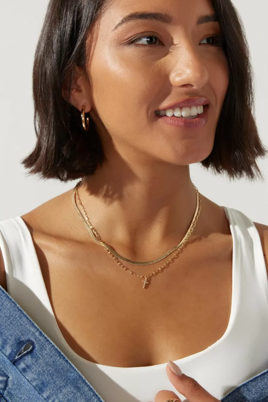 Francesca's Dana En Snake Cross Necklace